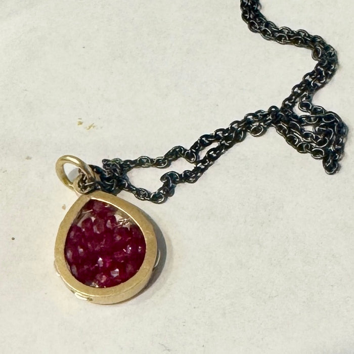 Reef pendant with ruby beads