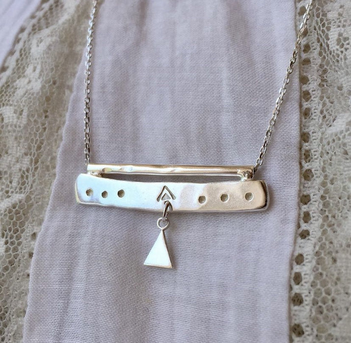 Silver bar necklace with triangle charm